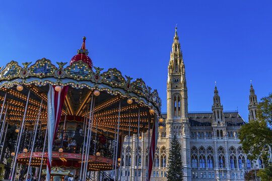 Children's carousel at the Christmas market at City Hall, behind the City Hall, Vienna, Austria