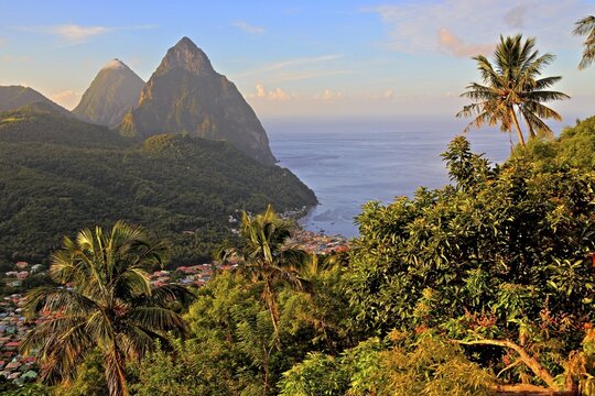 Tropical landscape with view of the village and the two Pitons, Gros Piton 770m and Petit Piton 743m, early morning sun, Soufriere, St. Lucia, Little Antilles, West Indian Islands, Caribbean Sea
