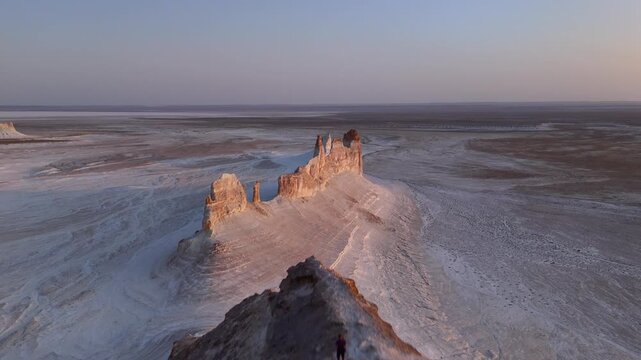 Aerial view of Bozzhyra View Point 1 featuring white limestone cliffs and vast desert plains in Karakiya District, Mangystau Region, Kazakhstan.