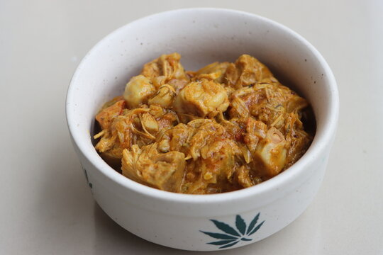 Spicy homemade jackfruit curry or Kathal masala, freshly cooked spicy jackfruit curry, traditional Asian cuisine made with Artocarpus heterophyllus, garnished with fresh herbs and served hot for lunch