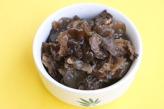 Edible jelly ear mushrooms. Fresh wood ear mushrooms in a bowl, ingredient for Asian cuisine
