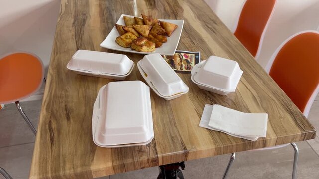 Takeout order lined up in an eatery.