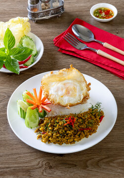 Rice topped with Southern-style yellow curry pork and a fried egg.