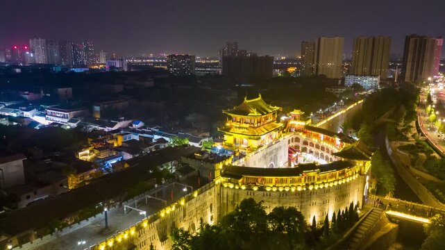 Illuminated Ancient City Wall and Gate Tower at Night in Xi'an, China