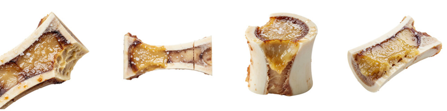 Roasted beef marrow bones with sea salt isolated on black background