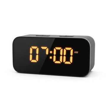 Digital alarm clock with glowing orange led numbers displaying seven am time on white background