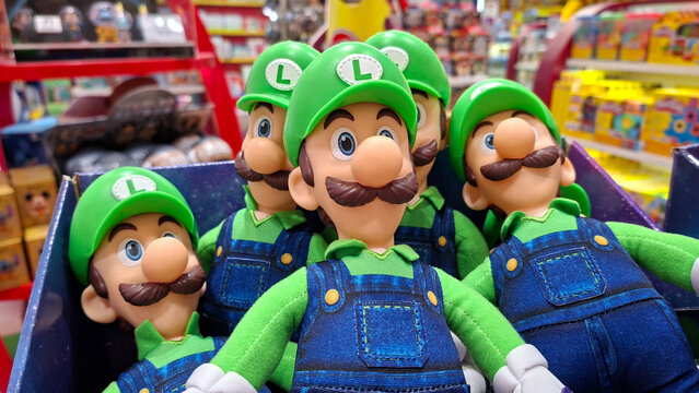 Luigi plush toys soft dolls stacked together on shelves on May 11, 2026 in Bangkok, Thailand.