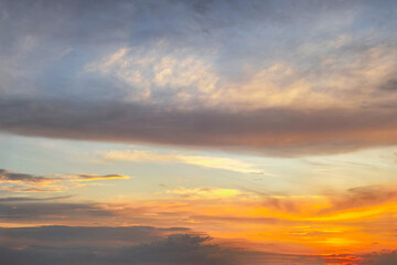 Obraz premium Colorful Sunset Sky With Dramatic Cloud Layers