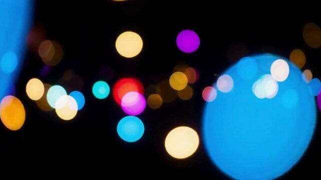 Abstract colorful bokeh lights on dark background, Vibrant festive defocused light circles backdrop
