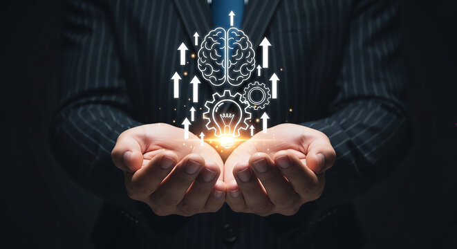 Innovation in Hand: A businessman holds out his open palms, symbolizing nurturing and developing new ideas, with a glowing light bulb and abstract representations of a brain, gears.