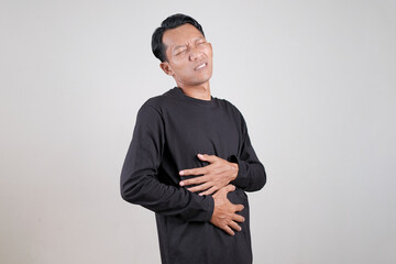 Fototapeta premium Man Showing Different Hand Gestures Isolated on Gray Background, Presentation and Communication Concept