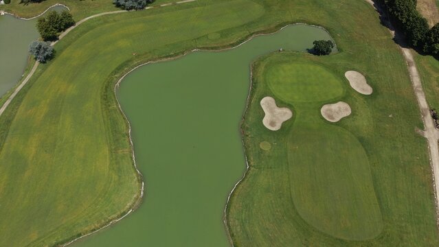 Golf Course And Pond Landscape Aerial View