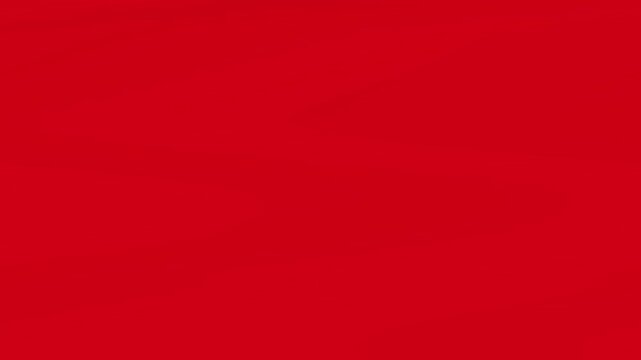 Solid vibrant red motion background with subtle texture