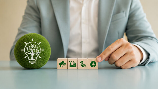 Sustainable Business Strategy Concept. Corporate environmental responsibility and green innovation. Wooden blocks with eco-friendly icons, CO2 reduction, sustainable industry and recycling.
