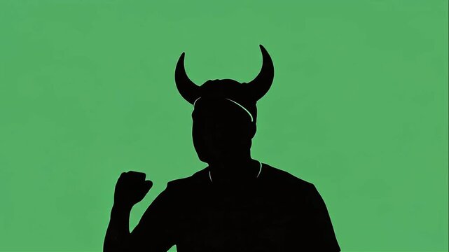 Horned silhouette celebrating with fist pump on green screen