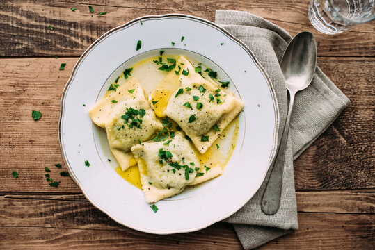 Vegetable ravioli in broth