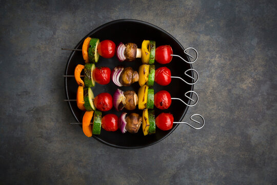 Vegetarian grill skewers on bowl
