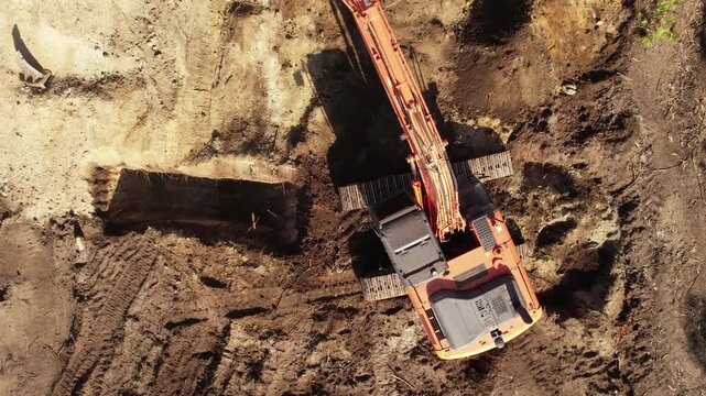 Top View of an excavator operating on a hillside