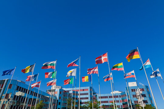 Luxembourg, European flags and parliament building in background