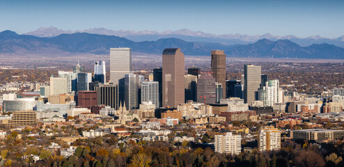 Aerial view of Denver city skyline and Rocky Mountain scenery in the United States © Kevin