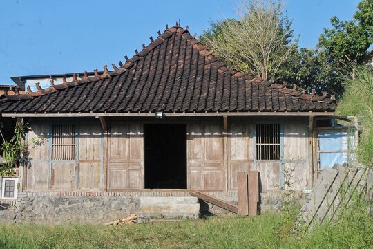 a traditional vernacular home of the Javanese people, primarily from Central Java and Yogyakarta, Indonesia