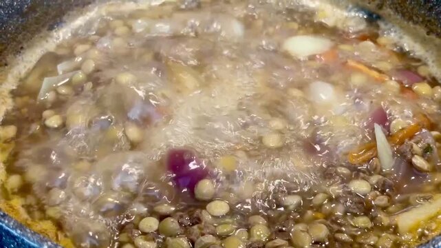 Close Up of Simmering Home Cooked Lentil Soup in Pot