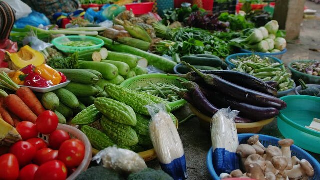 Fresh vegetables in baskets at an street market in Ha noi, vietnam. Asian stall with organic produce for sale, including local greens