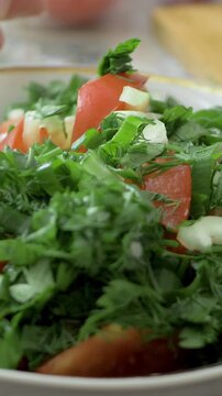 Bright tomatoes, crisp cucumbers, and sweet peppers mixed with fresh green onions. Simple ingredients, bringing natural flavors and textures to a healthy, homemade family dish