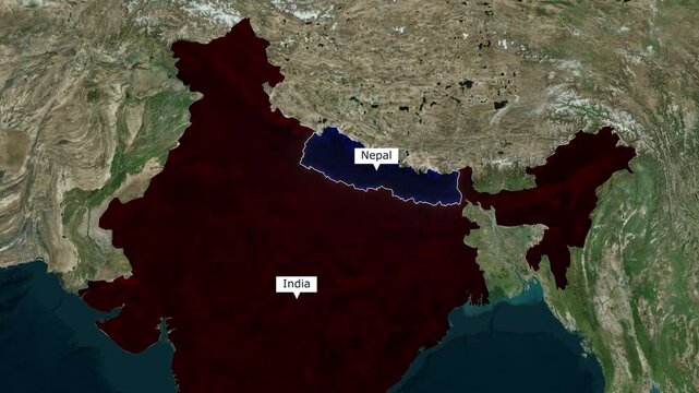 Satellite map animation of South Asia zooming in on India and Nepal showing country borders with dark highlights and text labels for geographical and geopolitical concepts