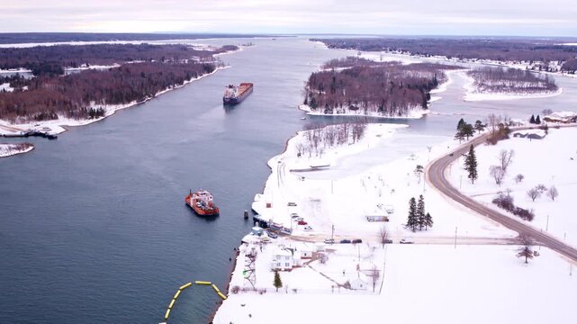 Aerial footage of a freighter approaching the Soo Locks along the Great Lakes route