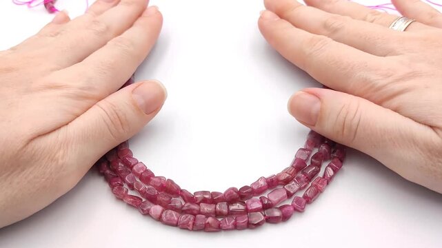 These strands of polished magenta gemstone beads feature organic square shapes for elegant jewelry projects that require a vibrant pop of color and a smooth professional finish for creators