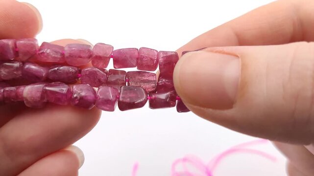 These strands of polished magenta gemstone beads feature organic square shapes for elegant jewelry projects that require a vibrant pop of color and a smooth professional finish for creators