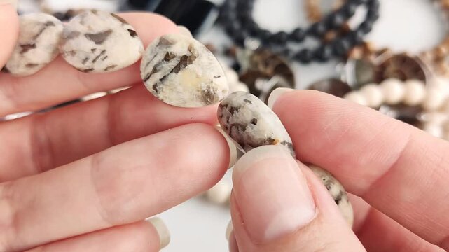 Professional tools measure high quality natural stone beads for detailed jewelry crafting projects requiring accurate dimensions and elegant aesthetics