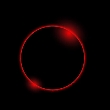 Bright glowing red circle with light particles isolated on a solid deep black background frame