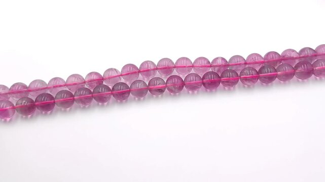 These polished strawberry quartz beads feature delicate red inclusions within clear stones for high quality jewelry design and sophisticated accessory creation work