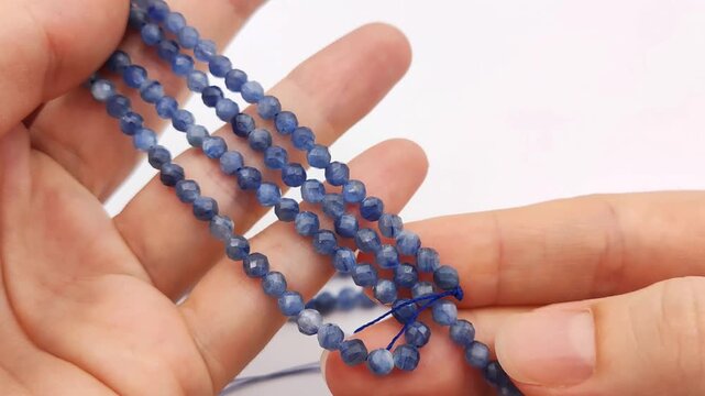 These natural dark blue kyanite stone beads feature a multifaceted cut on flexible stringing wire for crafting professional custom jewelry and elegant handmade accessory designs