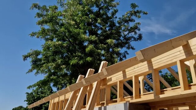 Extension of a family house, cubic shape modern with a flat roof and large windows and a terrace. wooden frame on which will be insulation and cladding. ecological renewable houses