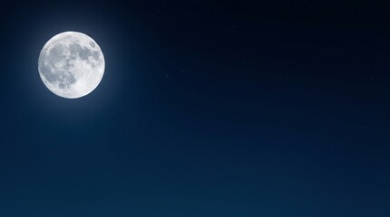 Naklejka premium A bright full moon shines in the dark night sky, casting a soft glow.