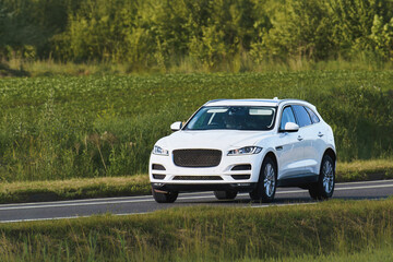 Fototapeta premium Elegant luxury SUV on comfortable road trip