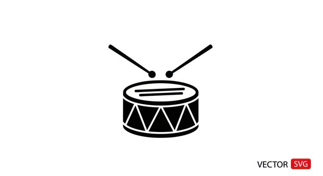 Drum with drumsticks on top closeup.