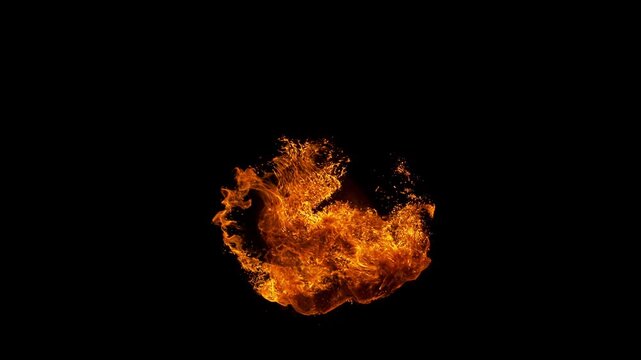 Small fire explosion with glowing sparks and embers isolated on a black background. Dynamic flames and combustion effects captured in high detail for dramatic visual impact.