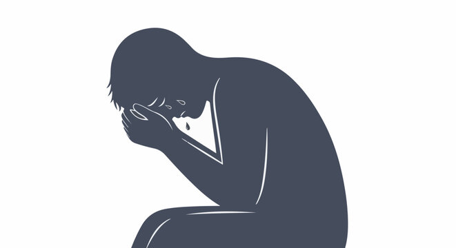 Silhouette of a person crying, head bowed, hands covering face