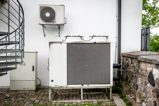 Commercial HVAC Condensing Unit Installed Outside Modern Building