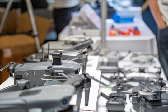 Multiple aerial drones on display at exhibition event