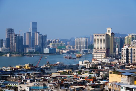 Macau city skyline with Gongbei subdistrict of Zhuhai, China. Macau cityscape in China.