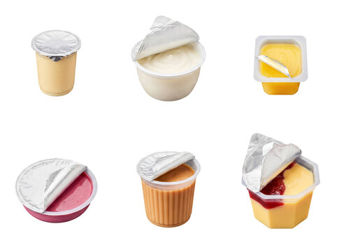 Collection of various single-serving yogurt or pudding cups with foil lids, some open.