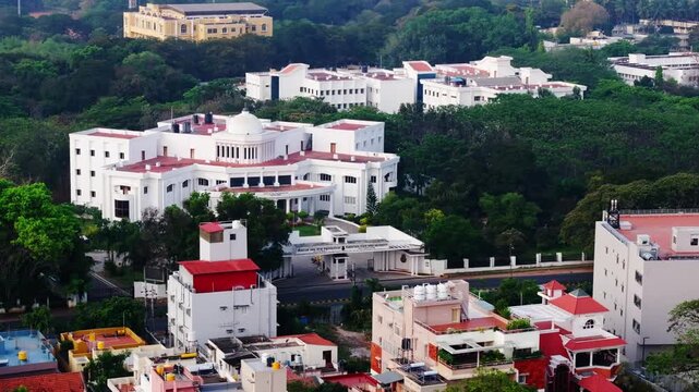 Karnataka State Open University Entrance with KSOU VIGNANA BHAVAN and Center For Information Science and Technology at Mysuru, karnataka, india. day time, semi circle shot, drone shot, 4k.