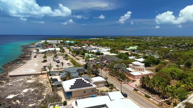 North West Point, Cayman Islands: Aerial view of turquoise Caribbean sea, tropical coastline and reef off Grand Cayman - landscape panorama from above
