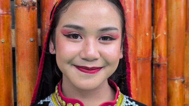 Young girl wearing complete set of Dusun Tindal Clothes Sinipak during Kaamatan Harvest Festival in Sabah