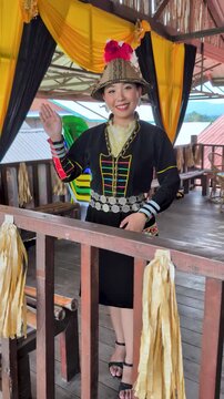 Portrait of Kadazan Dusun girl in Papar traditional attire during Kaamatan Festival in Kota Kinabalu Sabah Malaysia